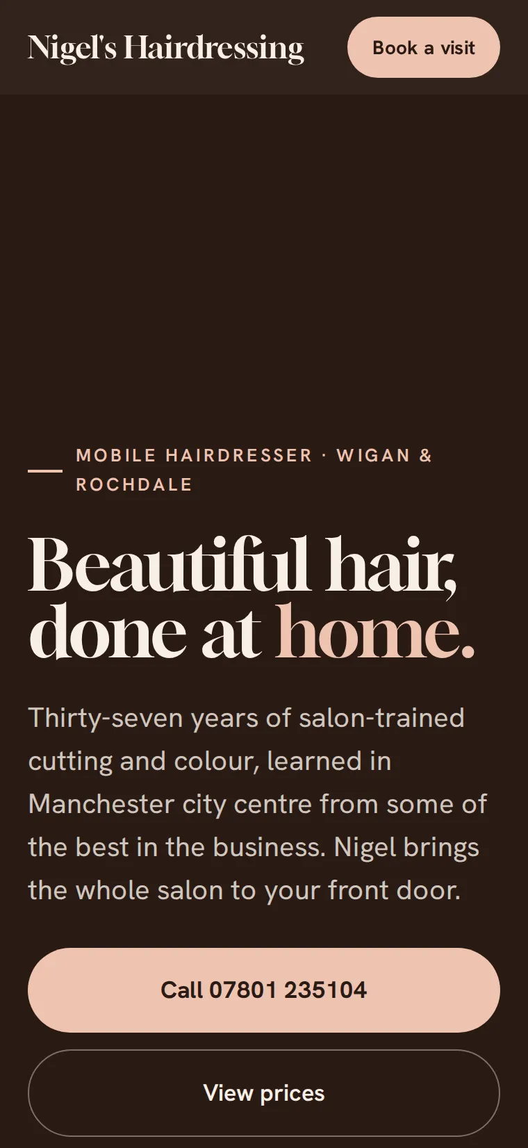 Nigel's Hairdressing on a phone